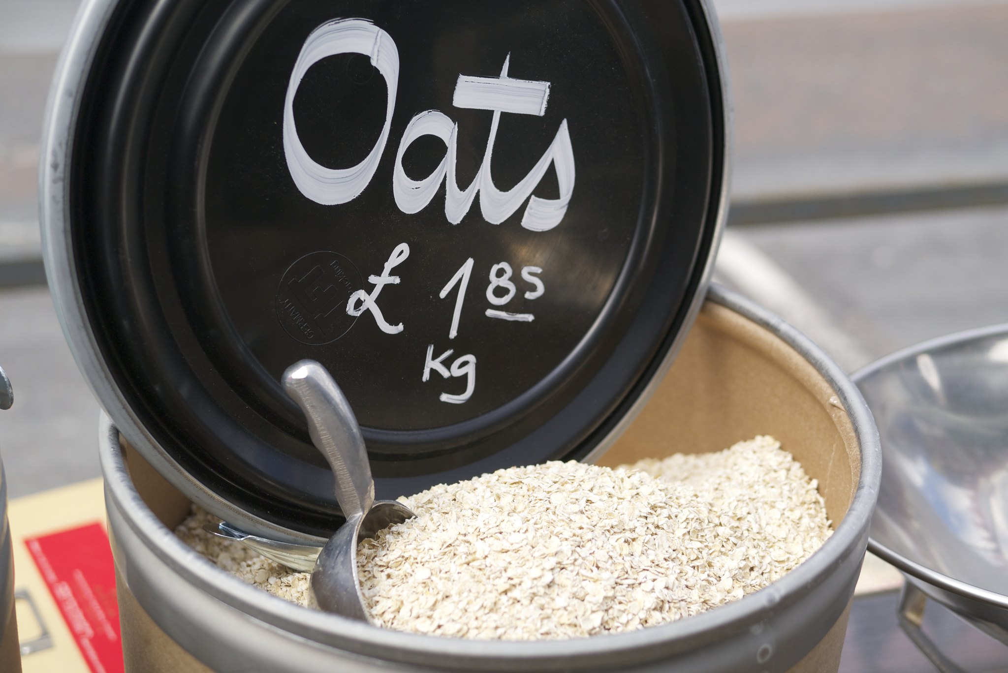 A photo of rolled oats sold in bulk for £1.85 per kilogram
