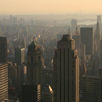 The New York City skyline in an orange haze of smog
