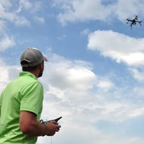 Person looking at a drone
