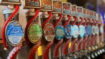 A photo of many beer taps at Lake Monster Brewery