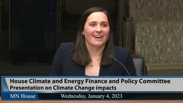 A photo of Heidi Roop presenting to the Minnesota House Climate and Energy Finance and Policy Committee 